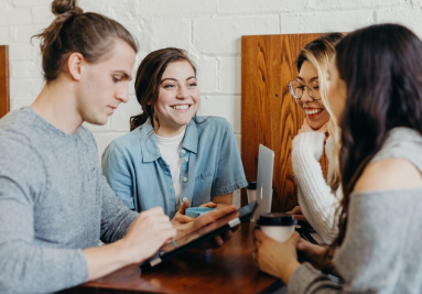 four people discussing something